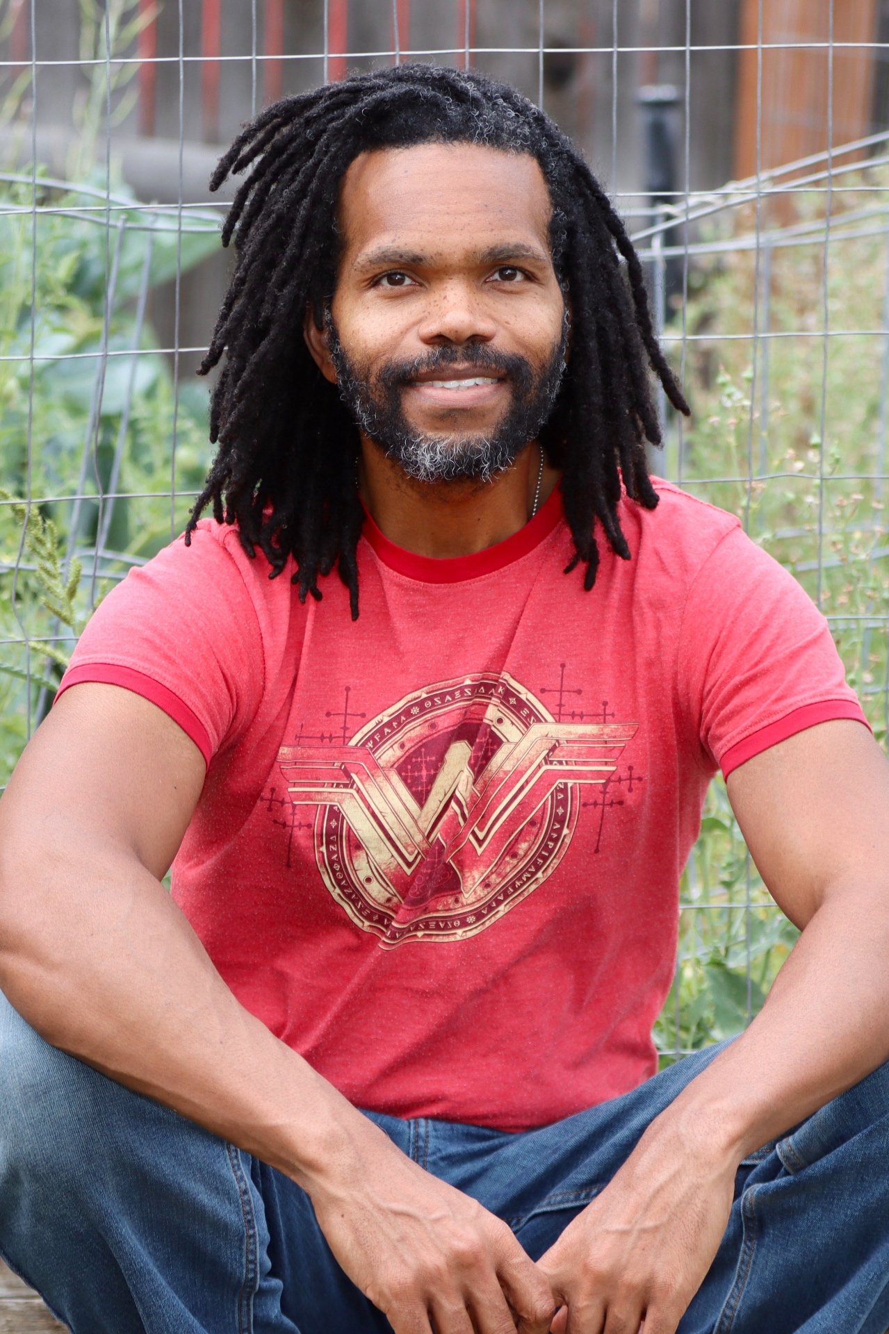 Portrait of a client with long Brother Locs